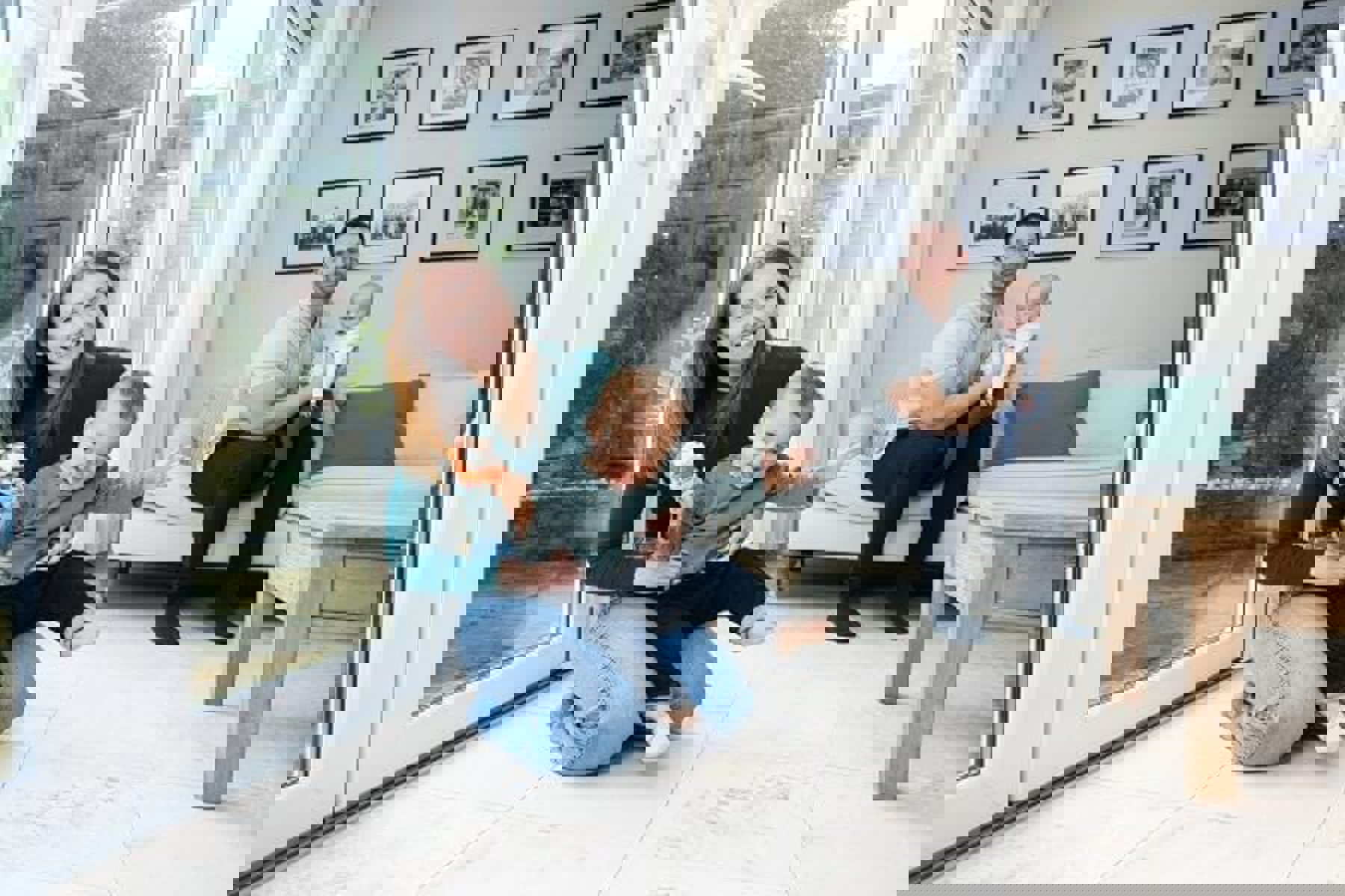 Family At Home In Living Room Smiling Toy