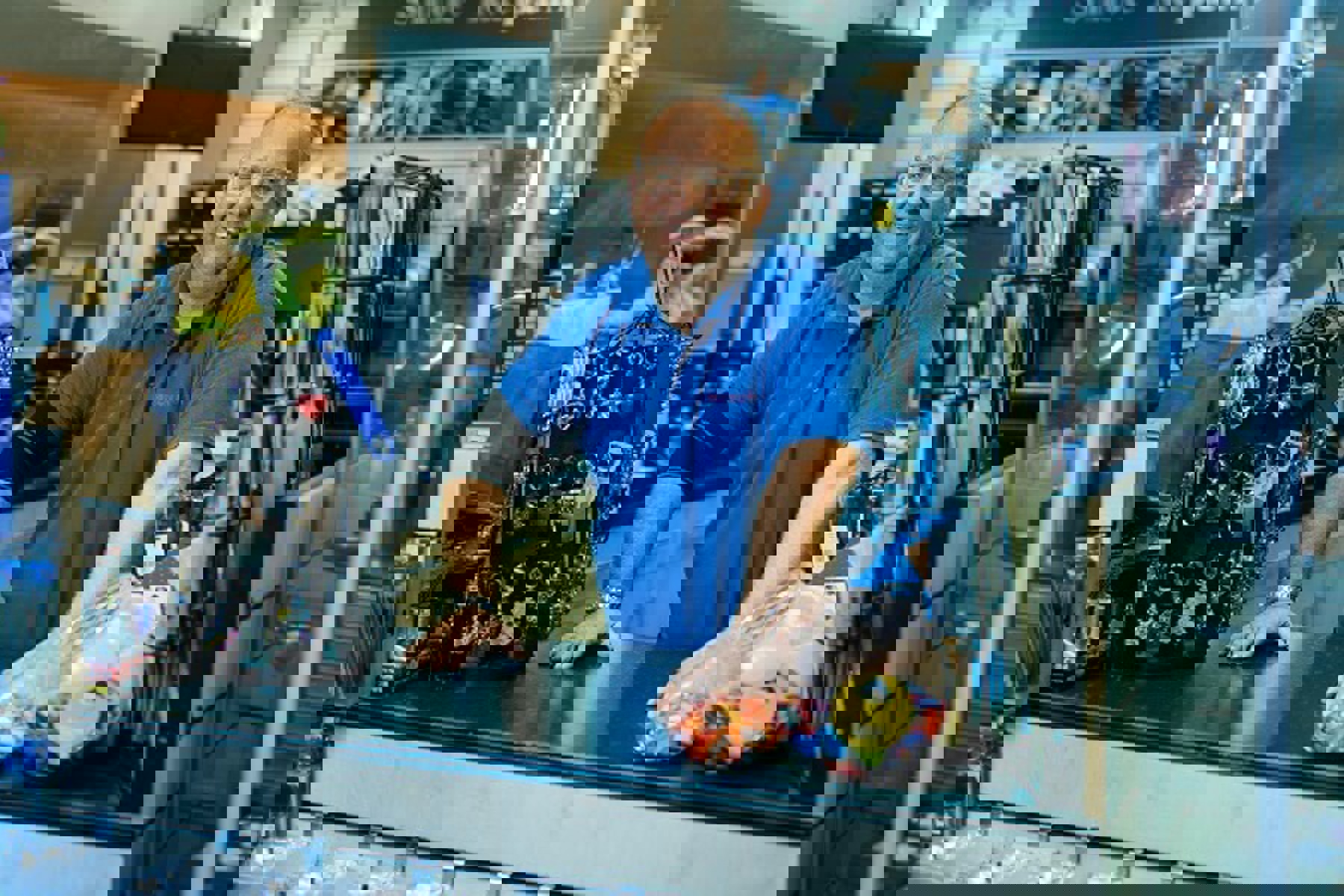 Man Blue Tshirt Shoe Repair Shop